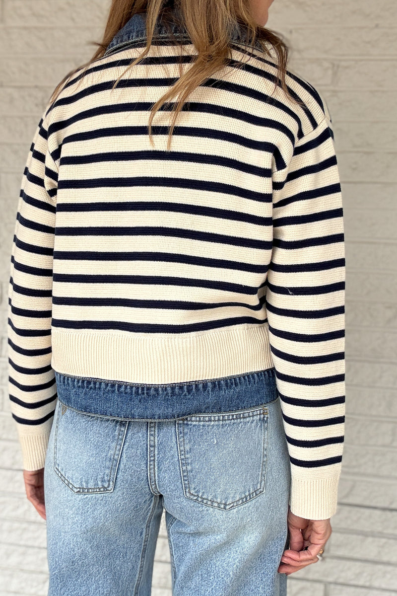 This Velvet Heart jacket is a playful twist on classic layering. Designed to look like a striped sweater over a denim jacket, it’s actually one lightweight piece for easy wear without bulk. Cream and navy knit stripes add a nautical touch, while the denim front and collar bring structure and texture. Women's fashion boutique Blanco Texas Johnson City Texas