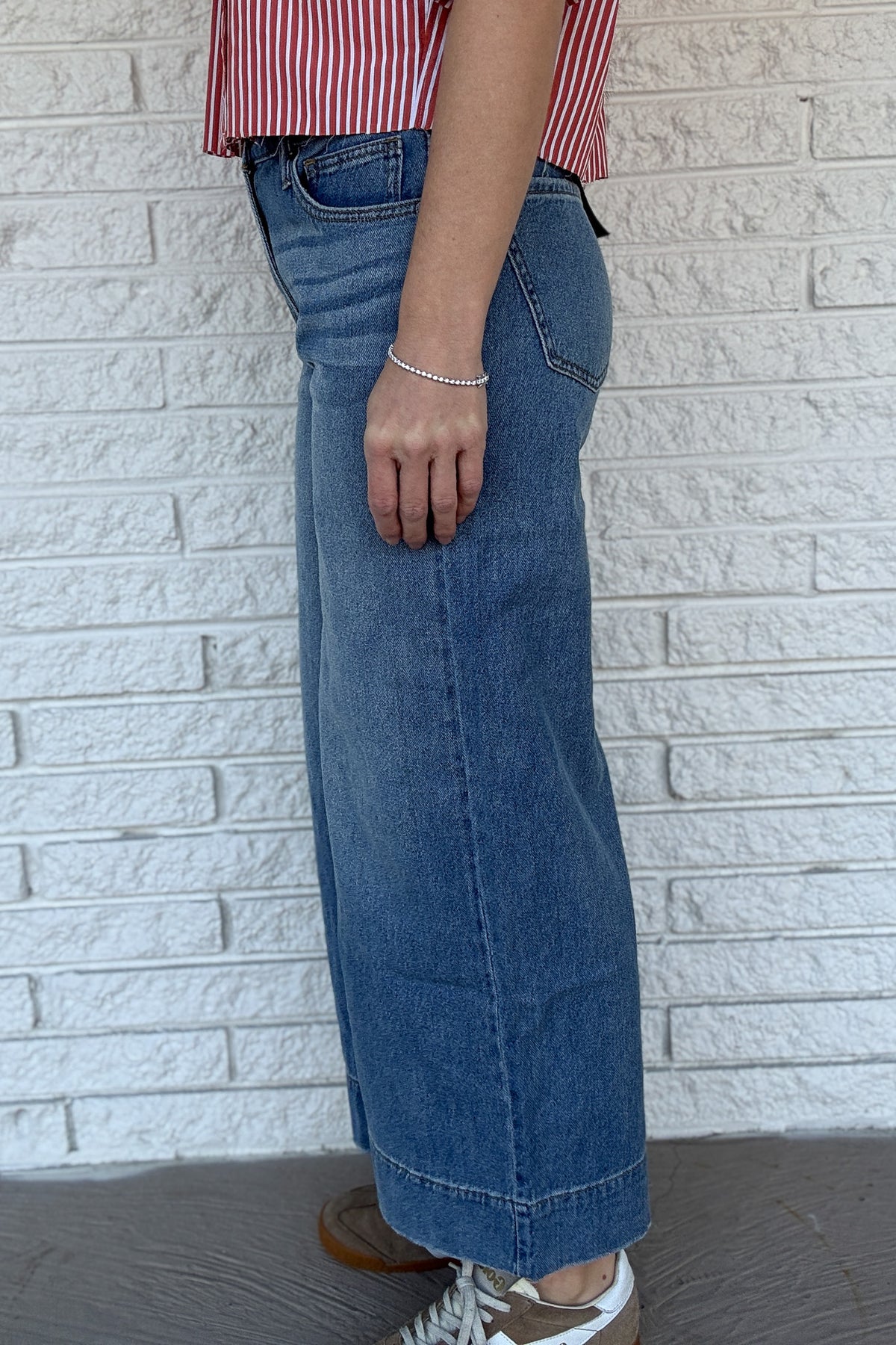A high-rise jean with a way-wide leg and ankle-length cut. Sculpted through the seat with a balanced, height-giving flare. Super soft, lightweight, and easy to wear every day!