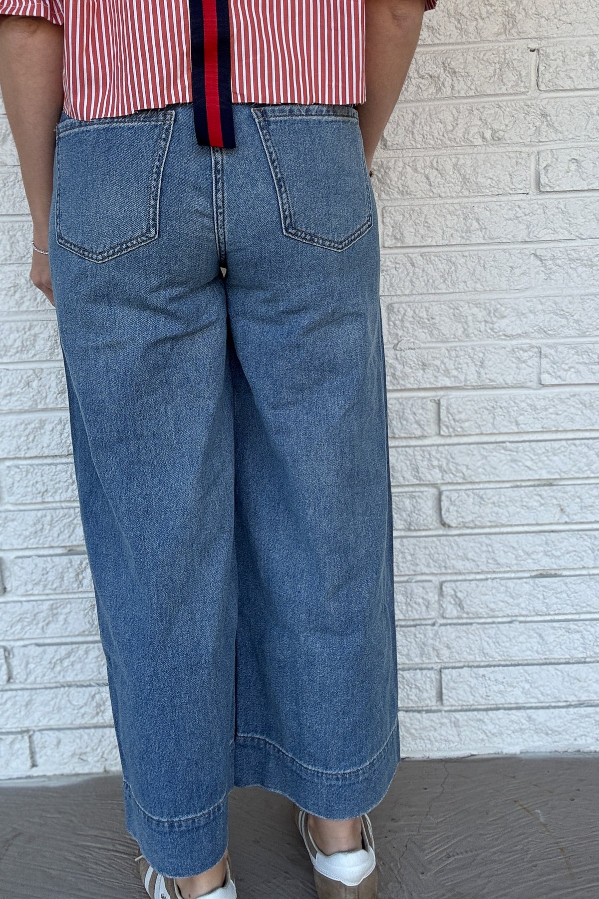 A high-rise jean with a way-wide leg and ankle-length cut. Sculpted through the seat with a balanced, height-giving flare. Super soft, lightweight, and easy to wear every day!