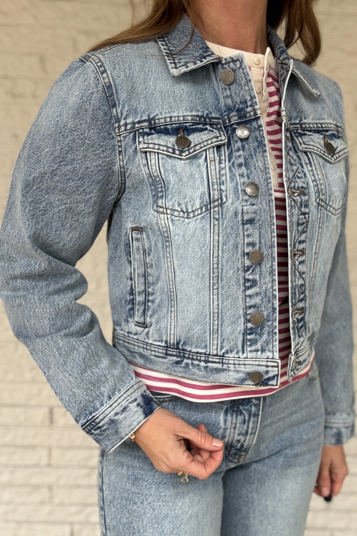 This 100% cotton denim jacket is an easy, everyday layer you’ll reach for all seasons. It has a clean, classic look with a modern cropped length that hits right above the waist on the model. Structured but comfortable, it’s perfect over tees, dresses, and tanks.