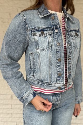This 100% cotton denim jacket is an easy, everyday layer you’ll reach for all seasons. It has a clean, classic look with a modern cropped length that hits right above the waist on the model. Structured but comfortable, it’s perfect over tees, dresses, and tanks. Women's fashion boutique Blanco Texas Johnson City Texas