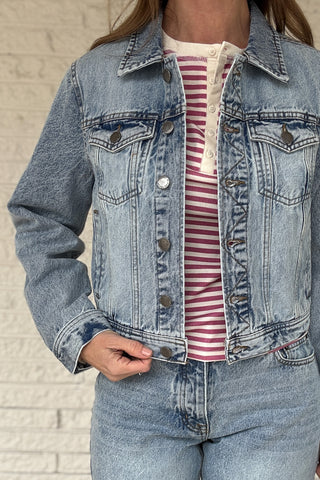 This 100% cotton denim jacket is an easy, everyday layer you’ll reach for all seasons. It has a clean, classic look with a modern cropped length that hits right above the waist on the model. Structured but comfortable, it’s perfect over tees, dresses, and tanks. Women's fashion boutique Blanco Texas Johnson City Texas
