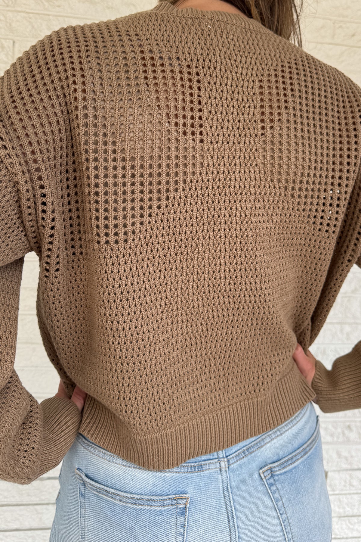 Effortless and timeless, this 100% cotton open knit sweater is the perfect layering piece for effortless clothing and everyday wear. Designed with a relaxed fit and breathable texture, it’s lightweight yet cozy — ideal for transitioning seasons or throwing on with denim for an easy, polished look.
