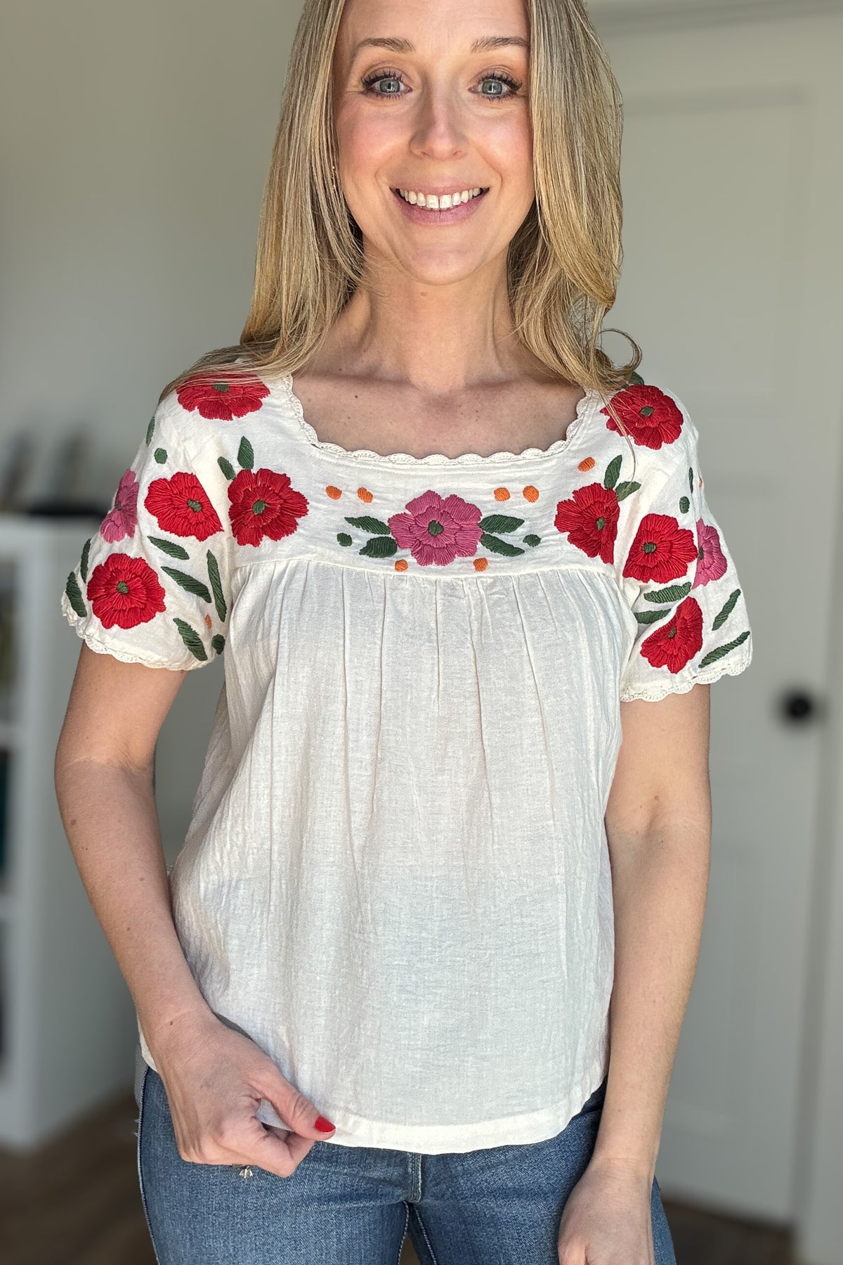 Indulge in elegance with our embroidered floral cotton blouse.

Made from 100% lightweight cotton, this creamy white blouse boasts a square neckline and delicate embroidery, adding a touch of sophistication to any ensemble.

Elevate your style with this exquisite piece.