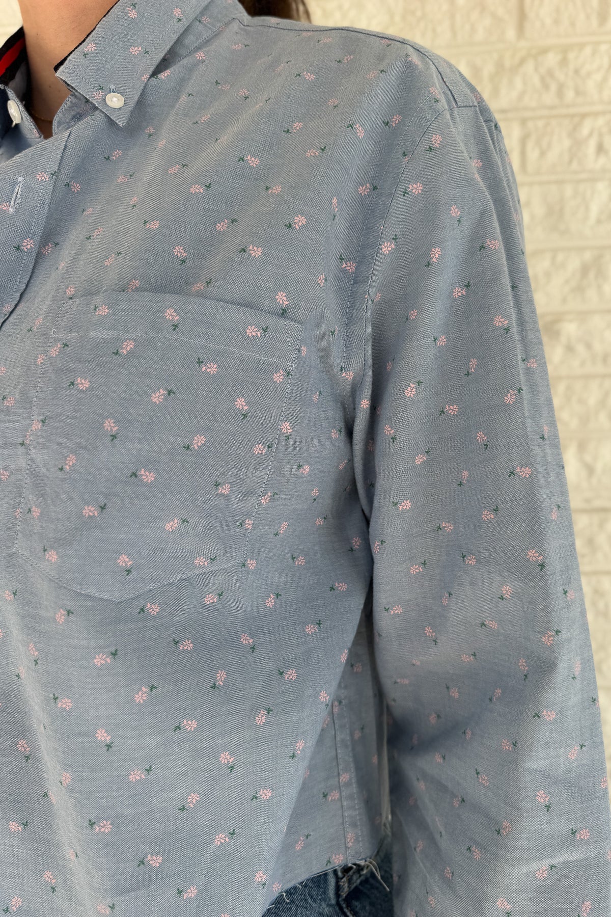 An upcycled men’s shirt reworked into a cropped, raw hem, easy silhouette that feels fresh and relaxed. Soft, feminine, and one-of-a-kind. Designed to be a one size fits most when worn open, wear it buttoned up and it fits like small or medium.