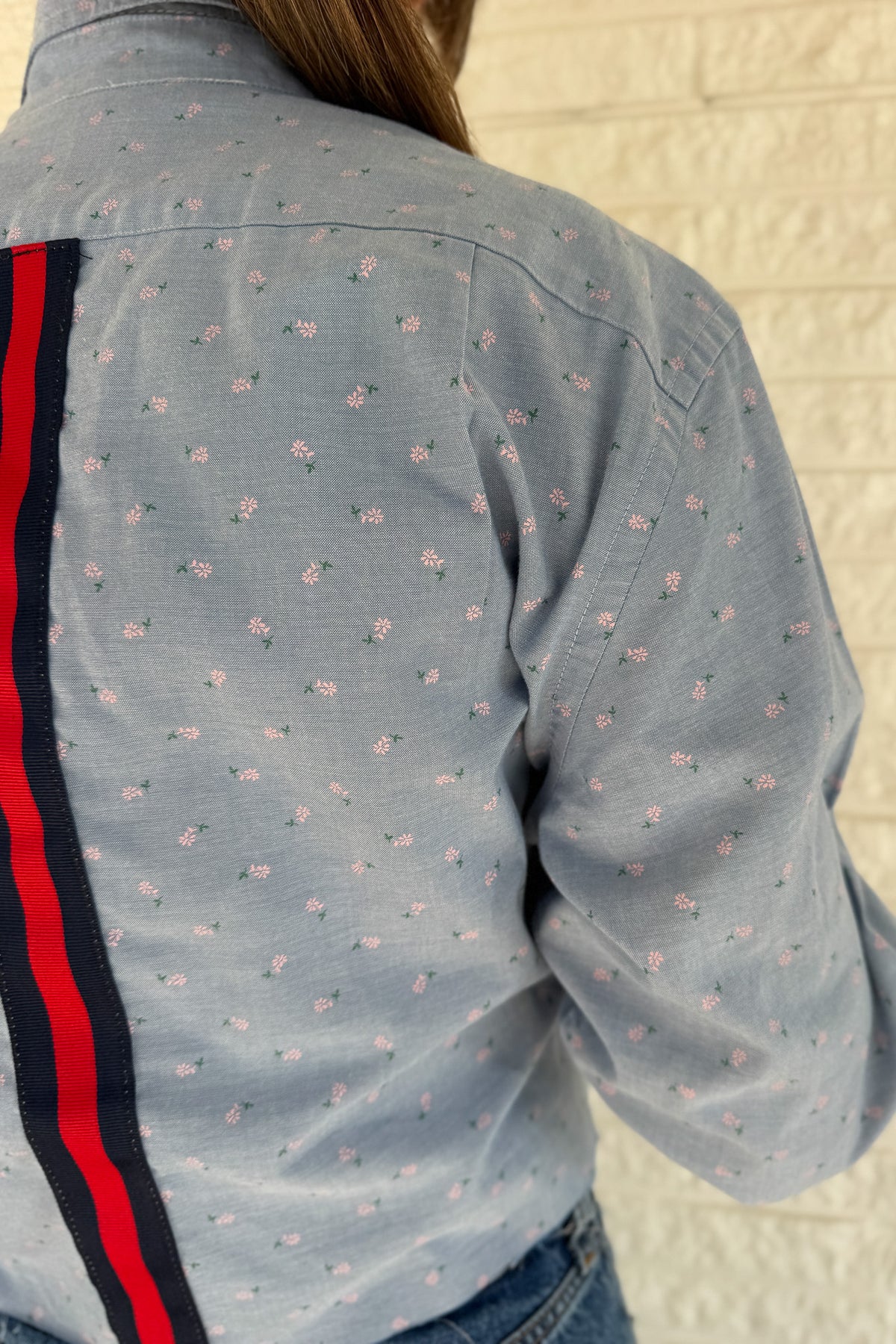 An upcycled men’s shirt reworked into a cropped, raw hem, easy silhouette that feels fresh and relaxed. Soft, feminine, and one-of-a-kind. Designed to be a one size fits most when worn open, wear it buttoned up and it fits like small or medium.