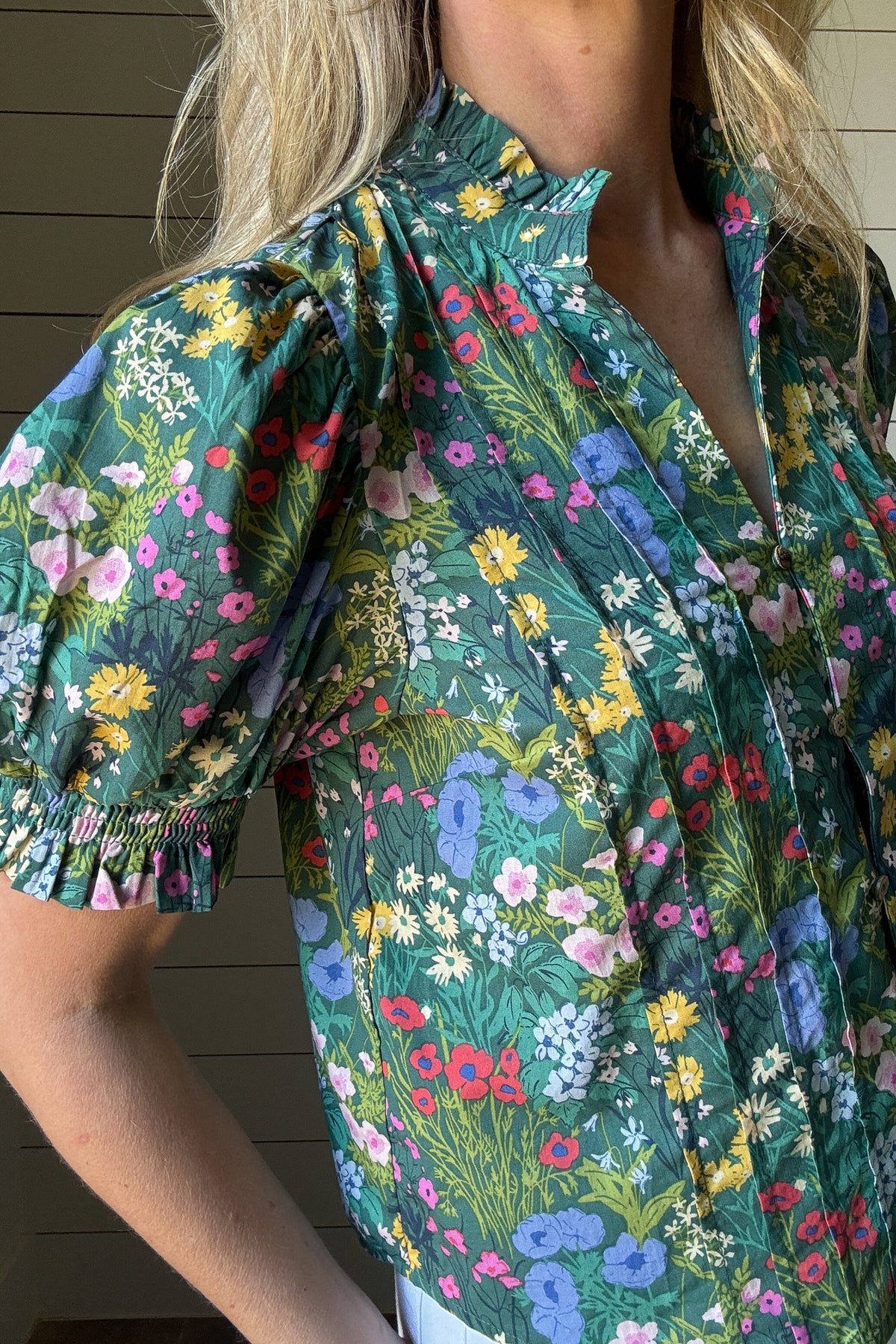 The Briar Floral Top is an easy pick for your everyday closet. Made from 100% cotton, it’s soft, breathable, and perfect for warm weather. The green floral print brings a fresh, feminine feel to this relaxed silhouette. Pin tuck detailing down the front adds subtle texture, while the smocked collar gives a soft, gathered touch around the neckline. It buttons all the way down the front with a placket overlay for extra coverage (none of us want gaping buttons!), making it easy to wear tucked or loose. Billowe
