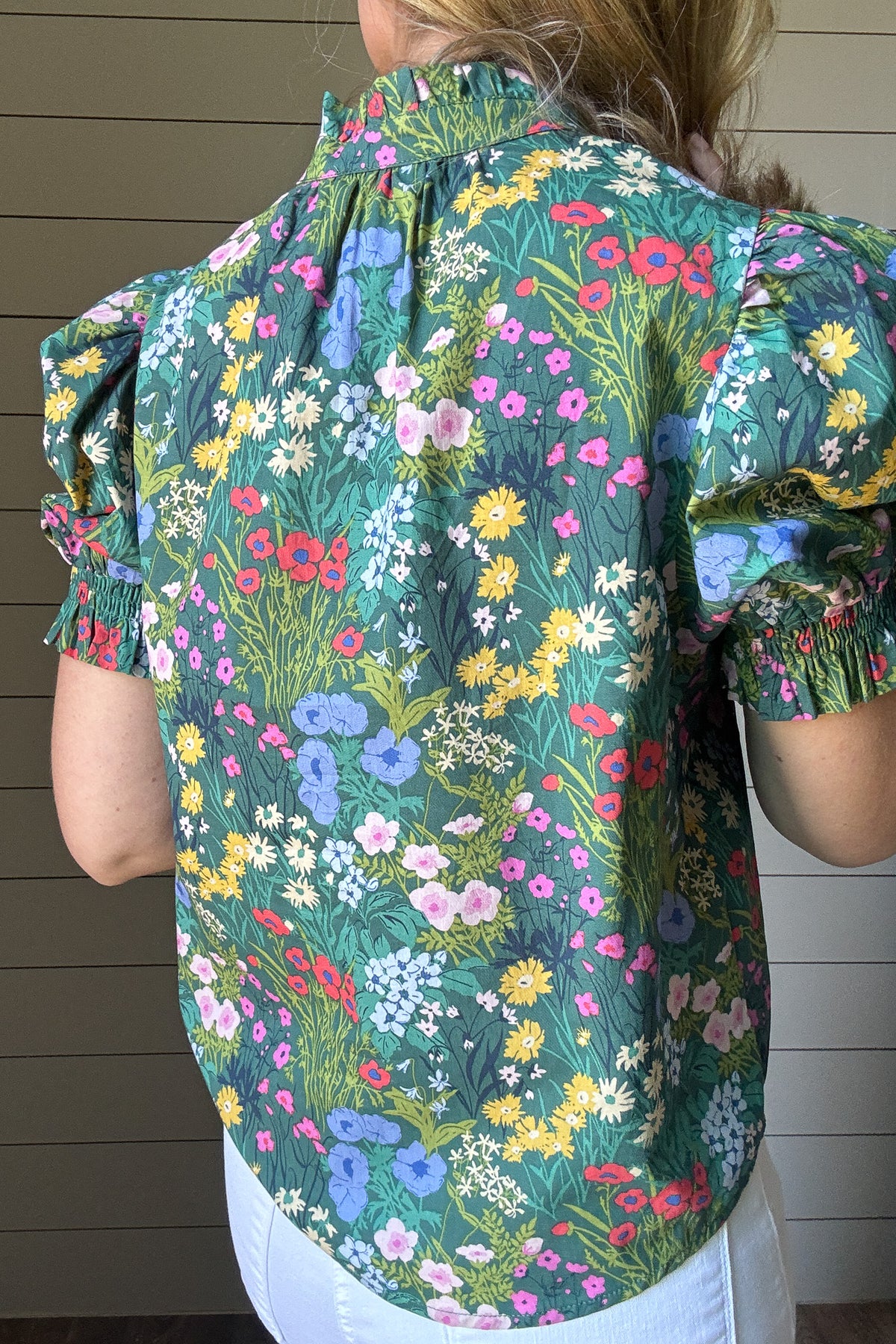 The Briar Floral Top is an easy pick for your everyday closet. Made from 100% cotton, it’s soft, breathable, and perfect for warm weather. The green floral print brings a fresh, feminine feel to this relaxed silhouette. Pin tuck detailing down the front adds subtle texture, while the smocked collar gives a soft, gathered touch around the neckline. It buttons all the way down the front with a placket overlay for extra coverage (none of us want gaping buttons!), making it easy to wear tucked or loose. Billowe