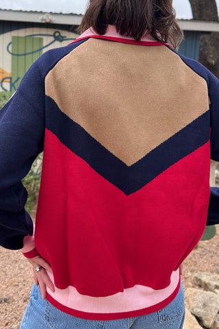back view of FRNCH women’s colorblock zip sweater cardigan in red, navy, camel and pink at Cotton & Cashmere boutique in Blanco, Texas