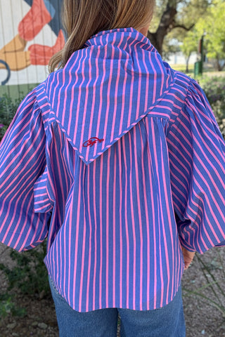 Women's colorful long sleeve blouse with a coordinating neck scarf, feminine pleated shoulder details, and relaxed silhouette. Shop effortless women's fashion in Blanco, Texas.