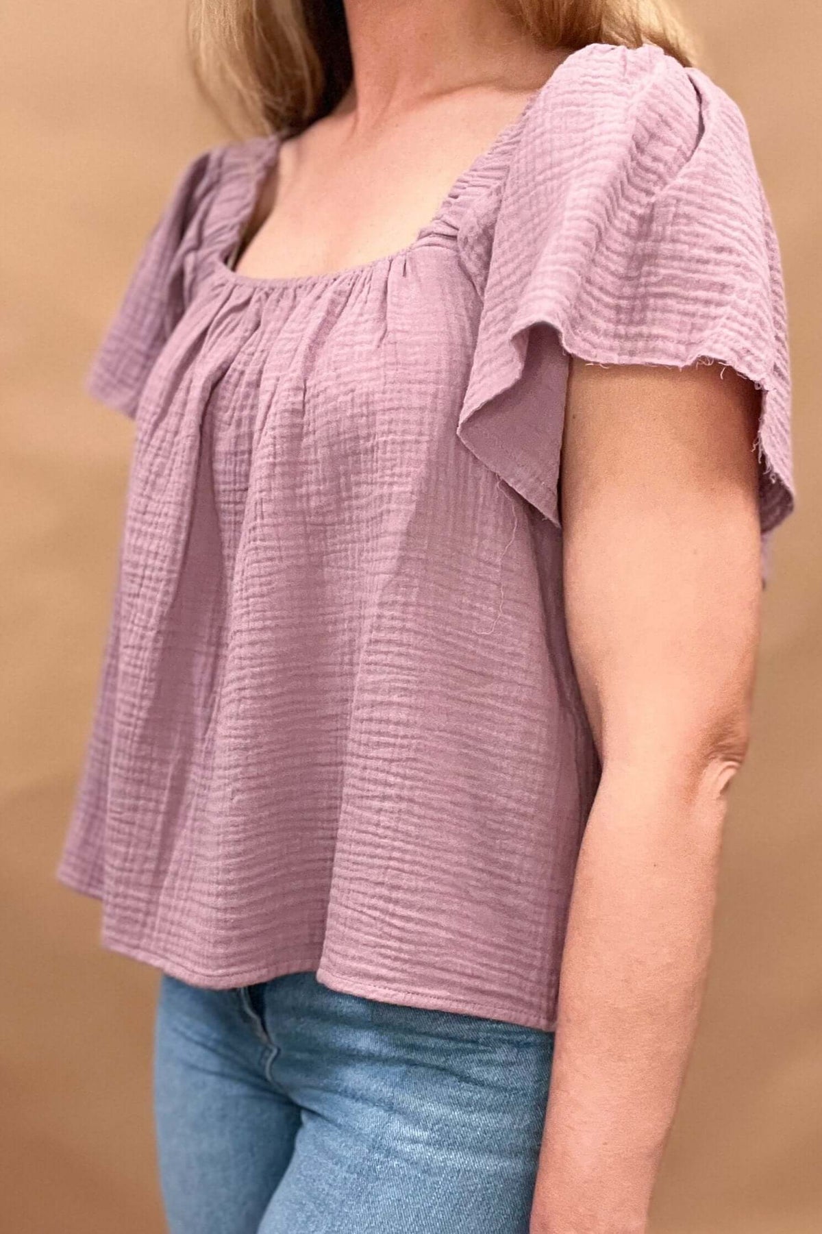 gauze lavender top raw cut sleeves 