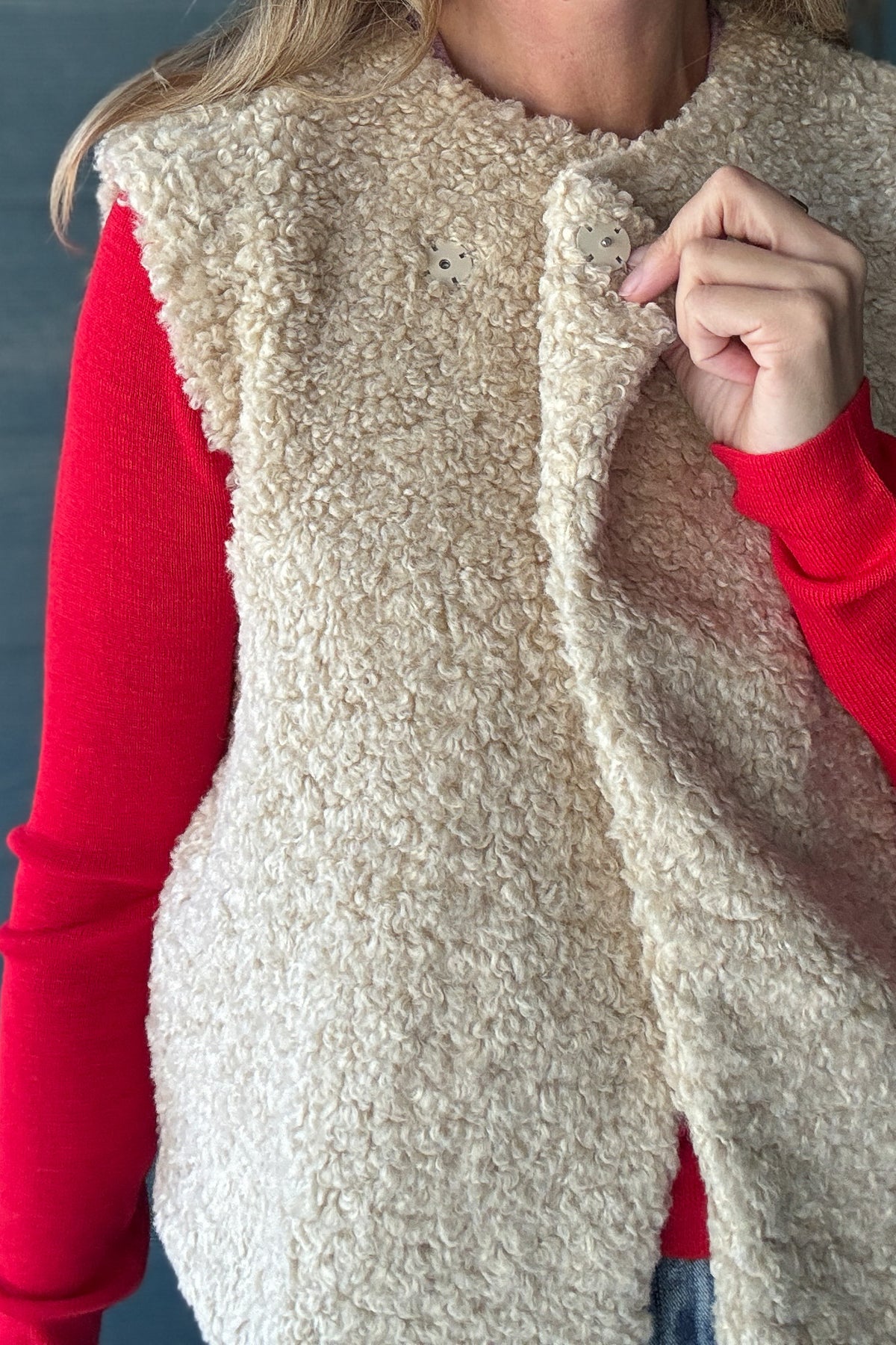 Women’s cream faux sherpa vest by Habitual Denim with wide collar, snap front and cozy textured finish.