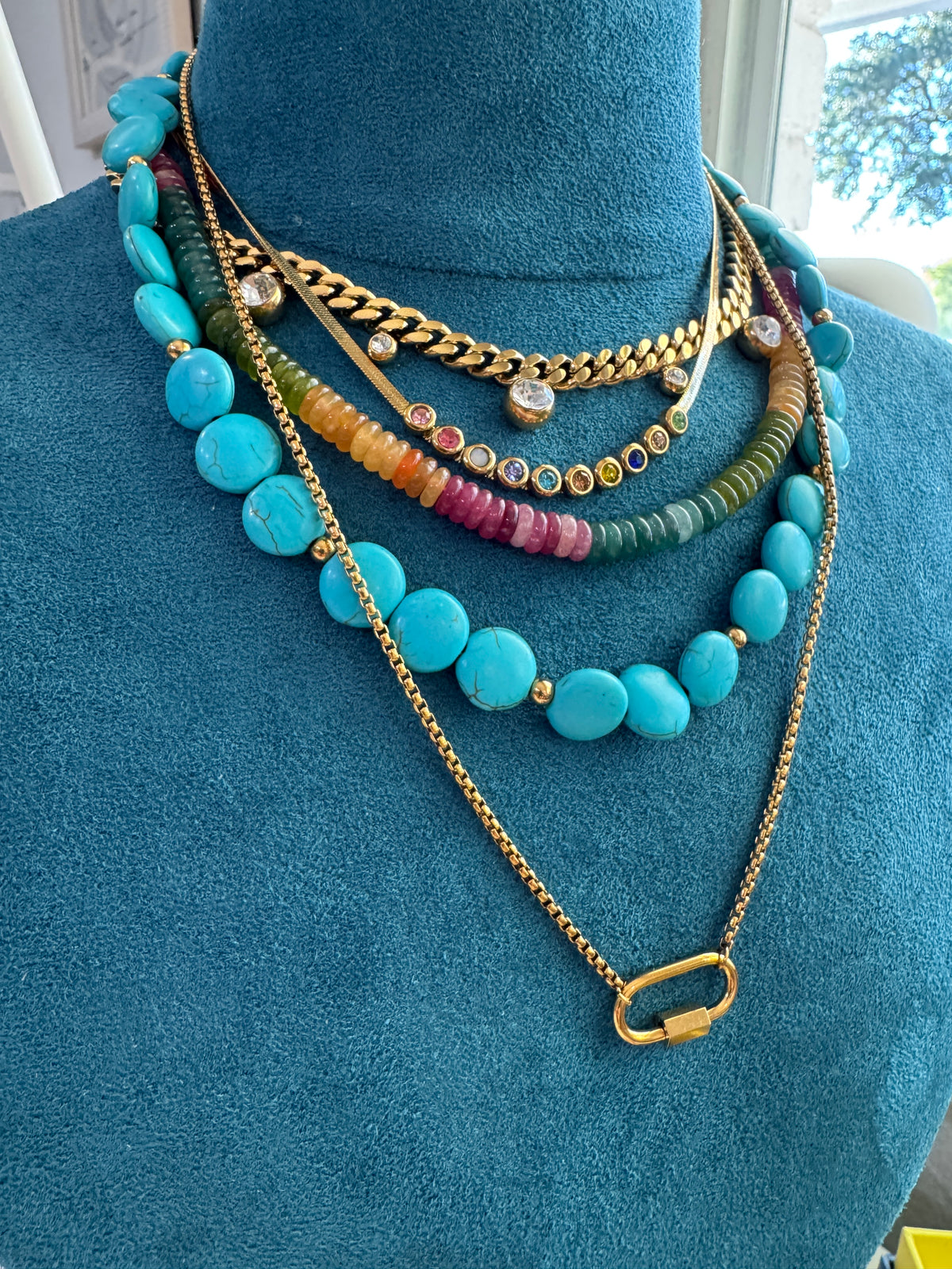 Dainty and sleek with just the right pop of color, this gold necklace brings a fun yet polished touch to any outfit. The colorful stones add subtle sparkle, making it perfect for layering or wearing on its own. Waterproof, tarnish resistant, and hypoallergenic—it’s made for everyday wear.