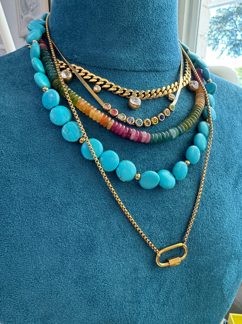 Dainty and sleek with just the right pop of color, this gold necklace brings a fun yet polished touch to any outfit. The colorful stones add subtle sparkle, making it perfect for layering or wearing on its own. Waterproof, tarnish resistant, and hypoallergenic—it’s made for everyday wear.