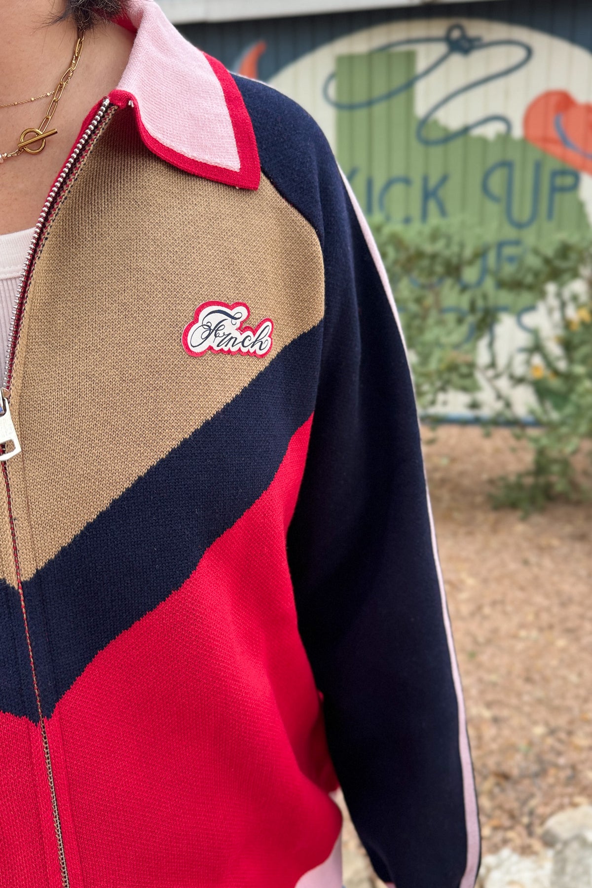 logo view FRNCH women’s colorblock zip sweater cardigan in red, navy, camel and pink at Cotton & Cashmere boutique in Blanco, Texas