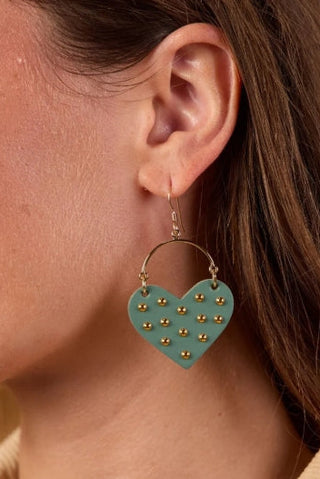 Harlow Heart Earrings by Nickel & Suede featuring playful green hearts with gold studs, available at Cotton & Cashmere in Blanco, Texas.