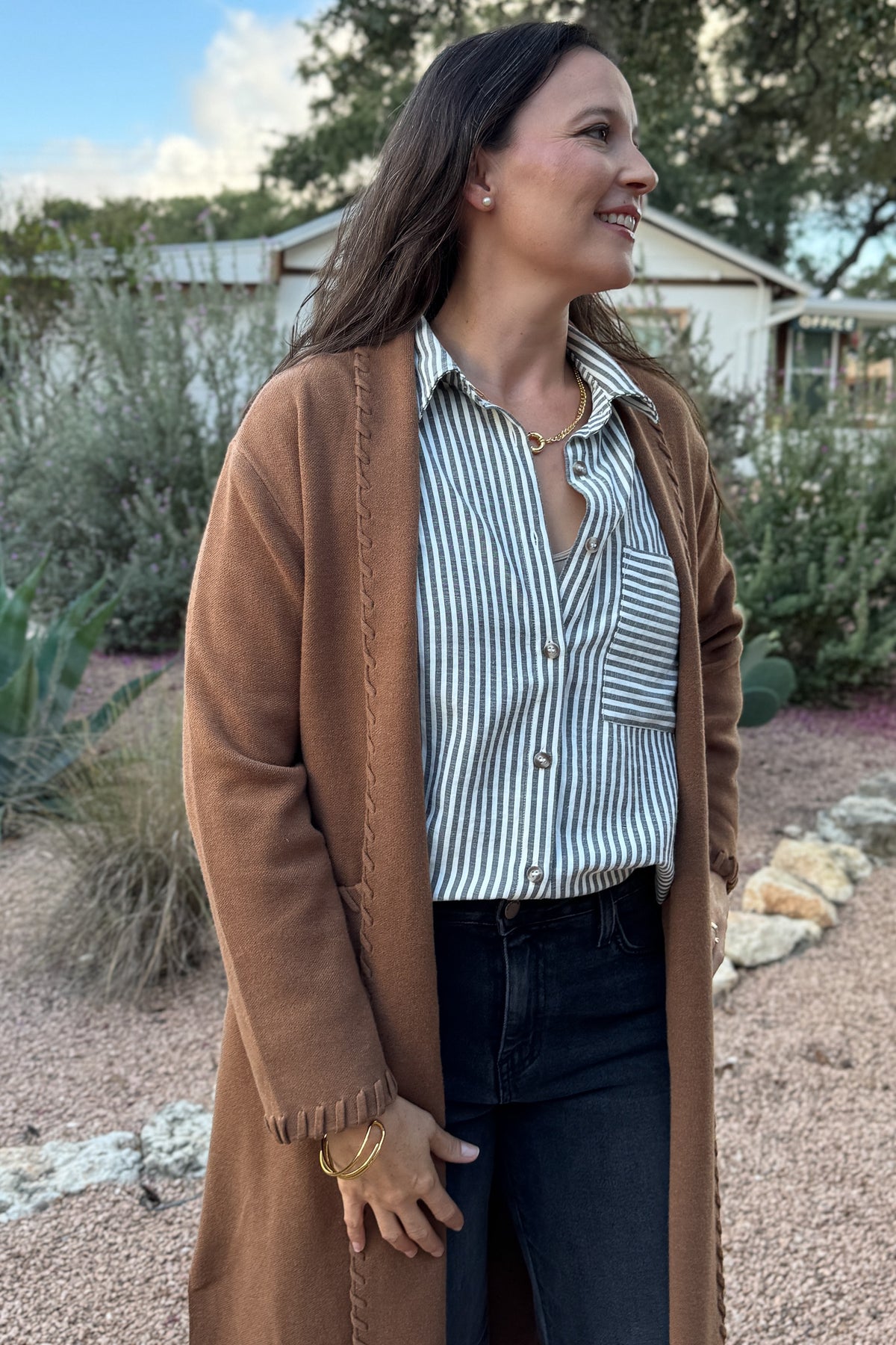 &nbsp;This long line cardigan with whipstitch detail adds a polished layer to any outfit. Soft and medium weight, it drapes beautifully while the whipstitch edging gives it a subtle, elevated touch.