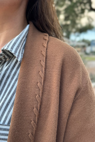 &nbsp;This long line cardigan with whipstitch detail adds a polished layer to any outfit. Soft and medium weight, it drapes beautifully while the whipstitch edging gives it a subtle, elevated touch.