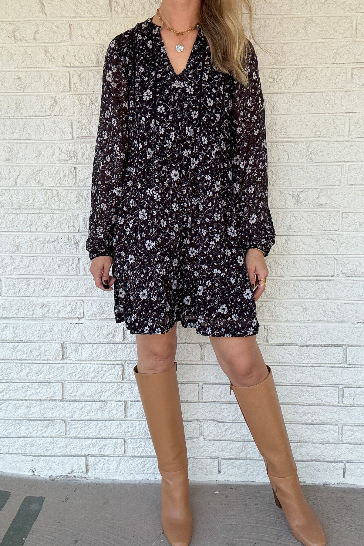 The Naomi Flowy Mini Dress has been restocked! Made from romantic Viscose Georgette, this dress boasts loose, airy sleeves and delicate ladder trim for a comfortable and stylish look. Pair it with your favorite fall boots for the ultimate day-to-night outfit that exudes effortless vibes. She's the mini dress, all grown up.