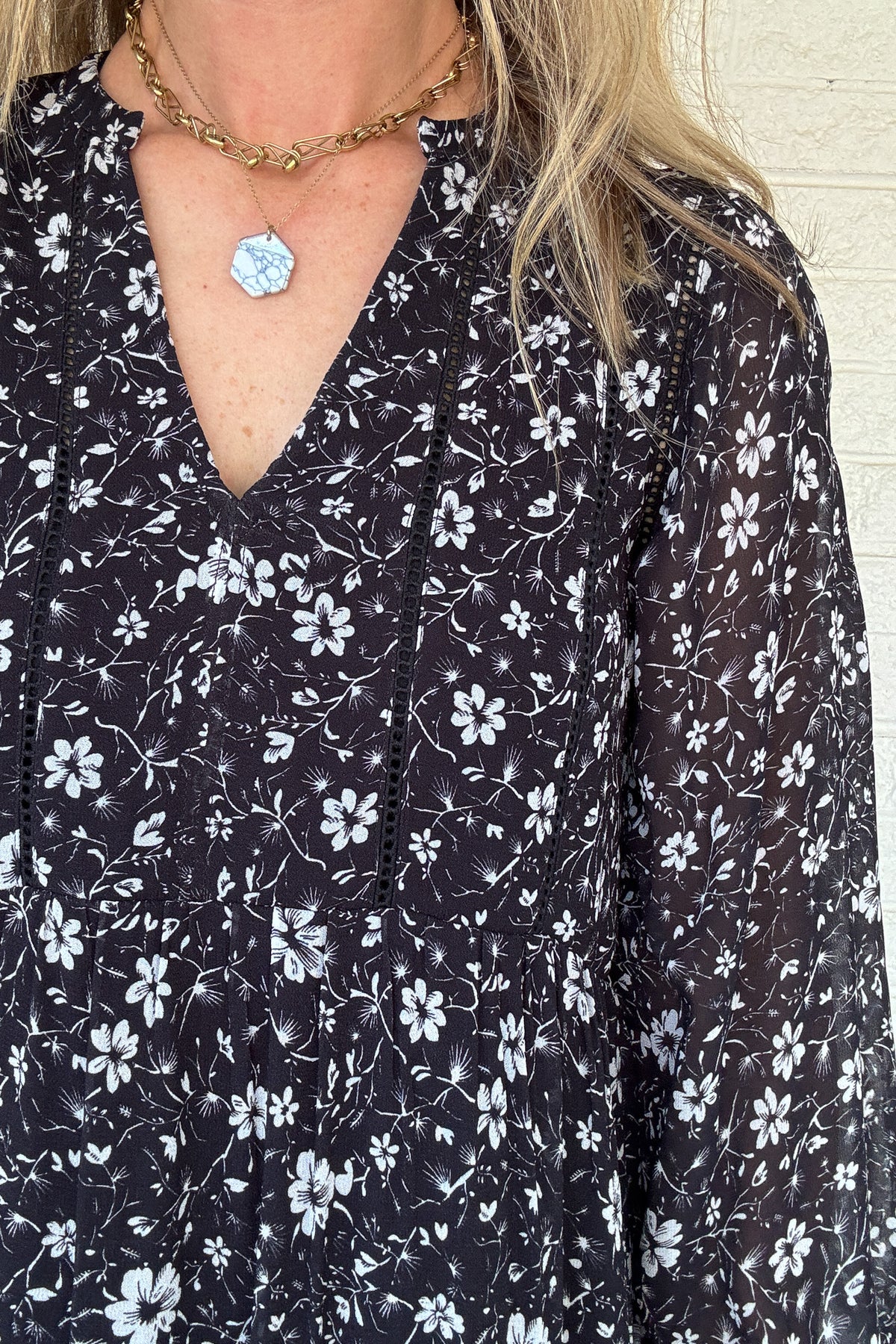 The Naomi Flowy Mini Dress has been restocked! Made from romantic Viscose Georgette, this dress boasts loose, airy sleeves and delicate ladder trim for a comfortable and stylish look. Pair it with your favorite fall boots for the ultimate day-to-night outfit that exudes effortless vibes. She's the mini dress, all grown up.