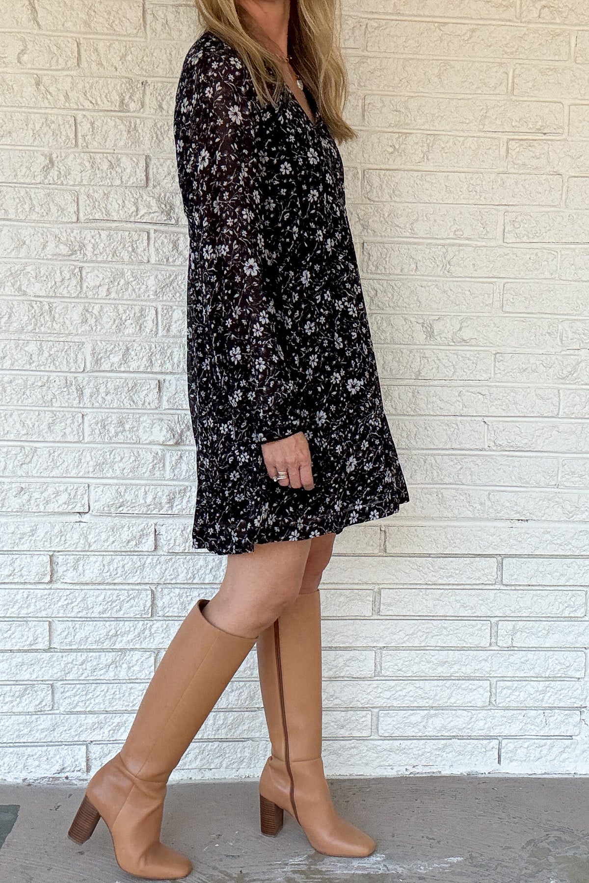 The Naomi Flowy Mini Dress has been restocked! Made from romantic Viscose Georgette, this dress boasts loose, airy sleeves and delicate ladder trim for a comfortable and stylish look. Pair it with your favorite fall boots for the ultimate day-to-night outfit that exudes effortless vibes. She's the mini dress, all grown up.