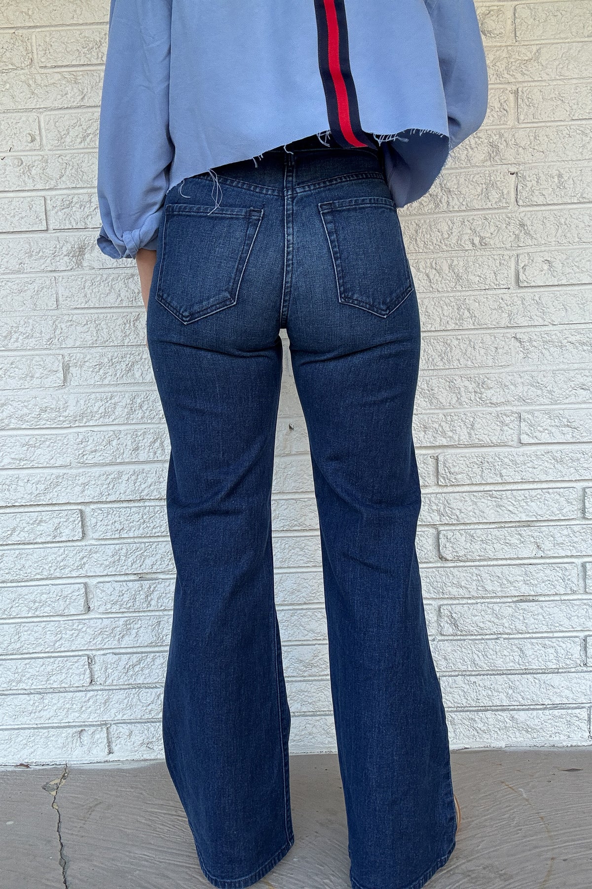 A clean, classic jean made from premium Italian cotton with a touch of stretch. Easy, flattering, and built for everyday wear!