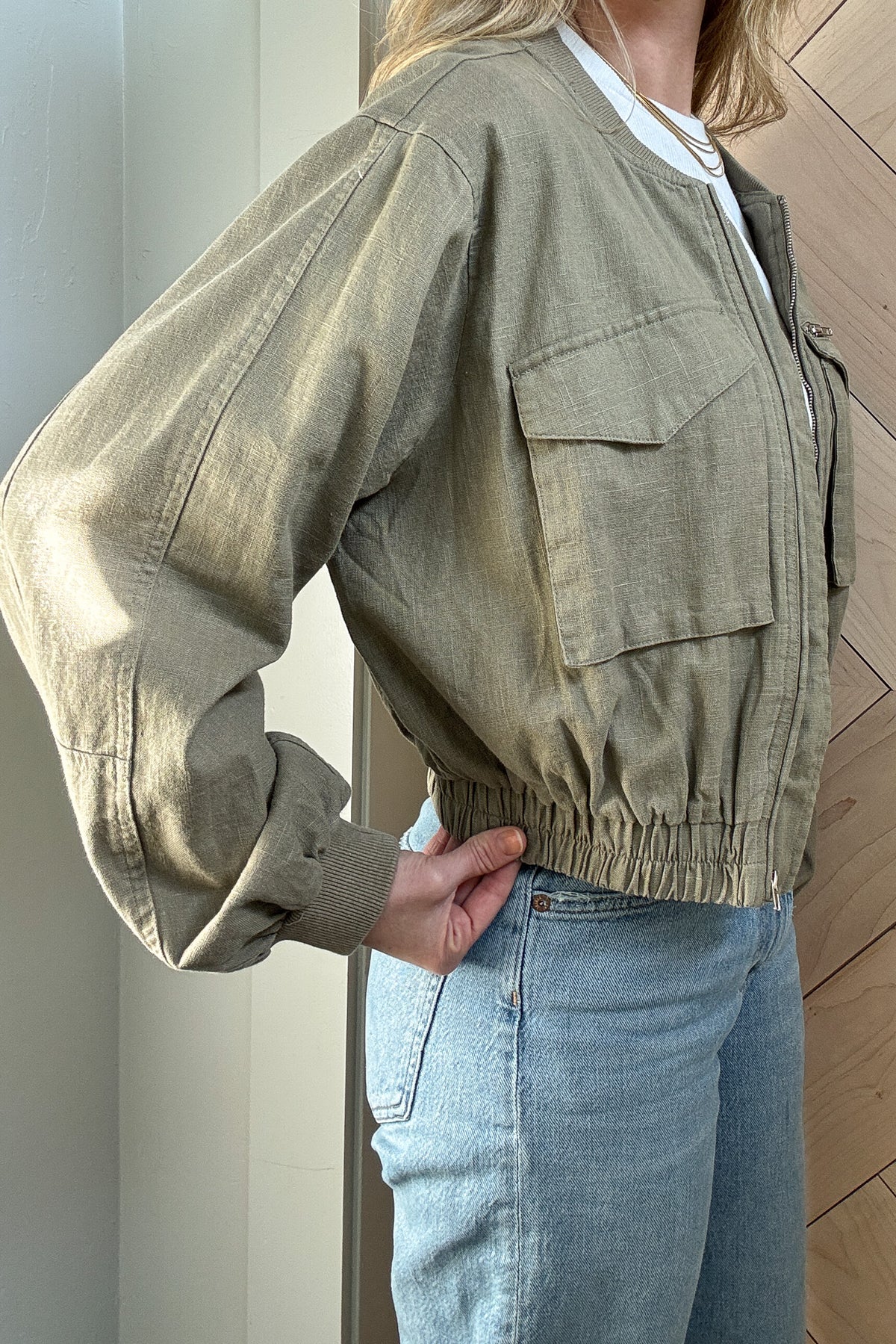 The versatile olive color pairs well with almost anything, making it a must-have for any season. Elevate your style with this must-have jacket!