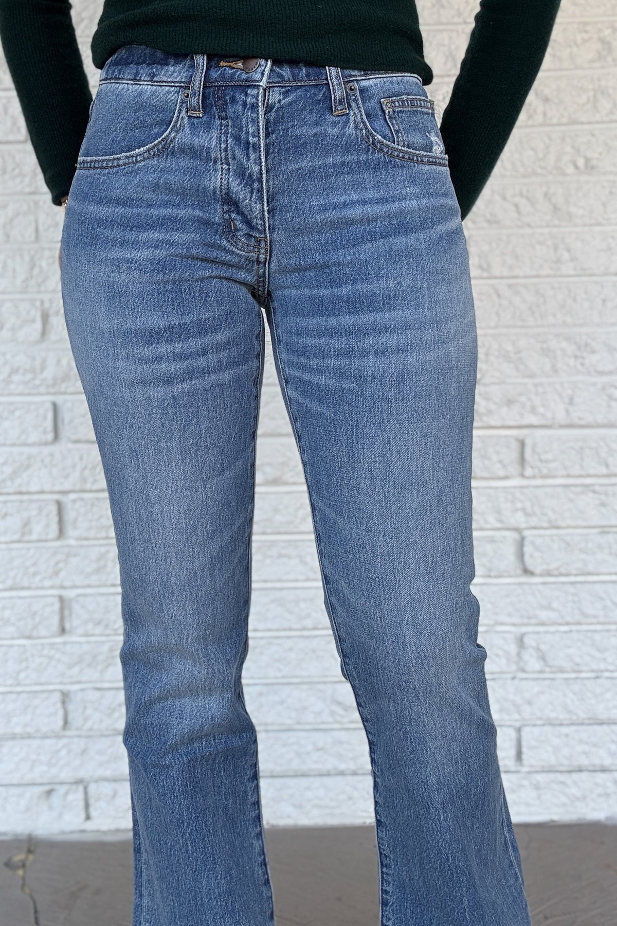 A classic mid-rise bootcut with a relaxed fit and button fly. Clean lines, finished hem, and an easy feel that works every day. Sustainably made with soft recycled cotton and a touch of stretch for comfort!
