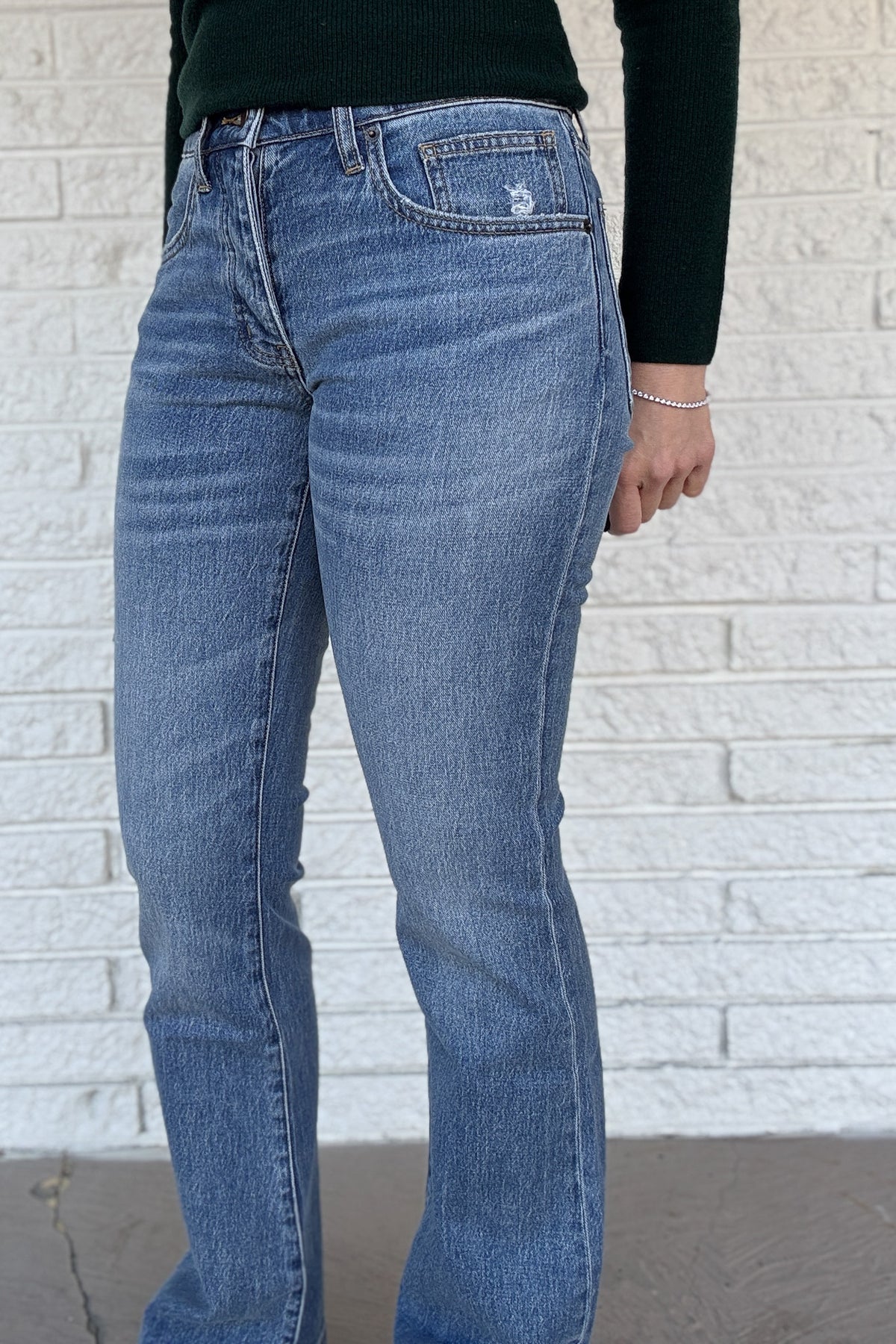 A classic mid-rise bootcut with a relaxed fit and button fly. Clean lines, finished hem, and an easy feel that works every day. Sustainably made with soft recycled cotton and a touch of stretch for comfort!