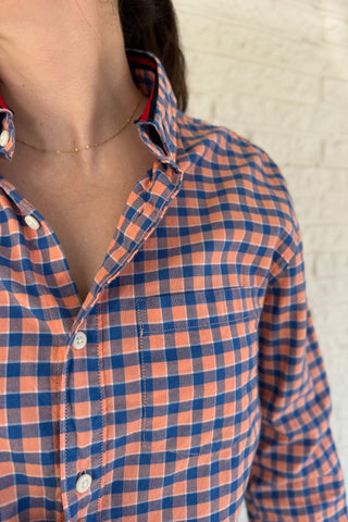 An upcycled men’s shirt reworked into a cropped, raw hem, easy silhouette that feels fresh and relaxed. Soft, feminine, and one-of-a-kind. Designed to be a one size fits most when worn open, wear it buttoned up and it fits like small or medium. Women's fashion boutique Blanco Texas Johnson City Texas