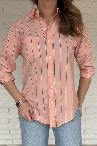 This striped button-down is an easy, everyday staple you’ll reach for on repeat. Made from breathable 100% cotton, it has a relaxed feel with a polished look that works tucked, tied, or worn open over a tee. The peach tone and vertical stripe keep it flattering and effortless from workdays to weekends.
Women's fashion boutique Blanco Texas Johnson City Texas