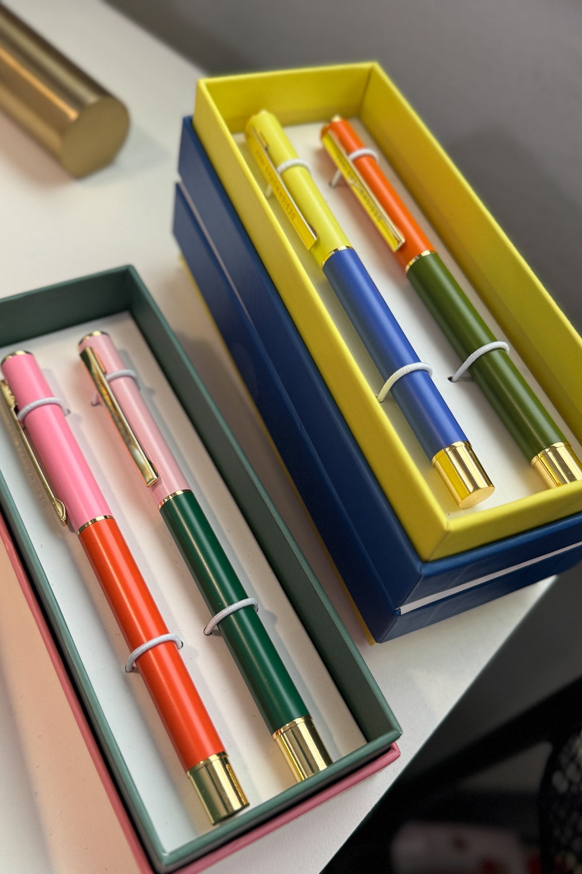 Brighten up the blah with our hot-hued writing utensils. Every set features two pens, each filled with rich black ink and decorated in vibrant, contrasting colors with a matte finish.