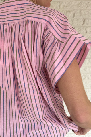 This lightweight striped top is an easy go to for polished everyday style! Designed in France, it features a flattering split neckline and relaxed dolman sleeves that drape beautifully without feeling oversized. The soft cotton fabric feels breathable and comfortable, making it perfect for warm days or easy layering under a jacket. The subtle stripe pattern adds interest while staying timeless, so you can dress it up for work or keep it casual with denim. Women's fashion boutique Blanco Texas