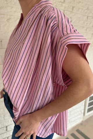 This lightweight striped top is an easy go to for polished everyday style! Designed in France, it features a flattering split neckline and relaxed dolman sleeves that drape beautifully without feeling oversized. The soft cotton fabric feels breathable and comfortable, making it perfect for warm days or easy layering under a jacket. The subtle stripe pattern adds interest while staying timeless, so you can dress it up for work or keep it casual with denim. Women's fashion boutique Blanco Texas