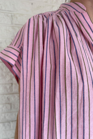 This lightweight striped top is an easy go to for polished everyday style! Designed in France, it features a flattering split neckline and relaxed dolman sleeves that drape beautifully without feeling oversized. The soft cotton fabric feels breathable and comfortable, making it perfect for warm days or easy layering under a jacket. The subtle stripe pattern adds interest while staying timeless, so you can dress it up for work or keep it casual with denim. Women's fashion boutique Blanco Texas