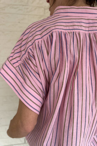 This lightweight striped top is an easy go to for polished everyday style! Designed in France, it features a flattering split neckline and relaxed dolman sleeves that drape beautifully without feeling oversized. The soft cotton fabric feels breathable and comfortable, making it perfect for warm days or easy layering under a jacket. The subtle stripe pattern adds interest while staying timeless, so you can dress it up for work or keep it casual with denim. Women's fashion boutique Blanco Texas