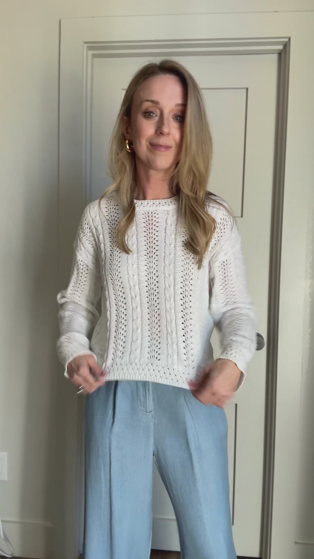 Fit video for white open knit sweater