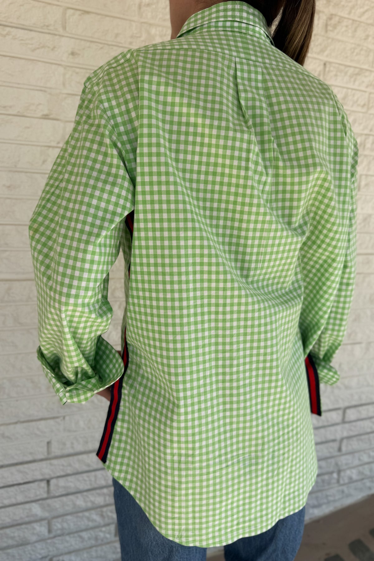 The modern Stormy button-down is designed to move with you for an easy, elevated feel. The cropped front flows into a longer back for a flattering high-low shape that adds interest to a classic style. Finished details give this piece a polished look that works dressed up or casual.