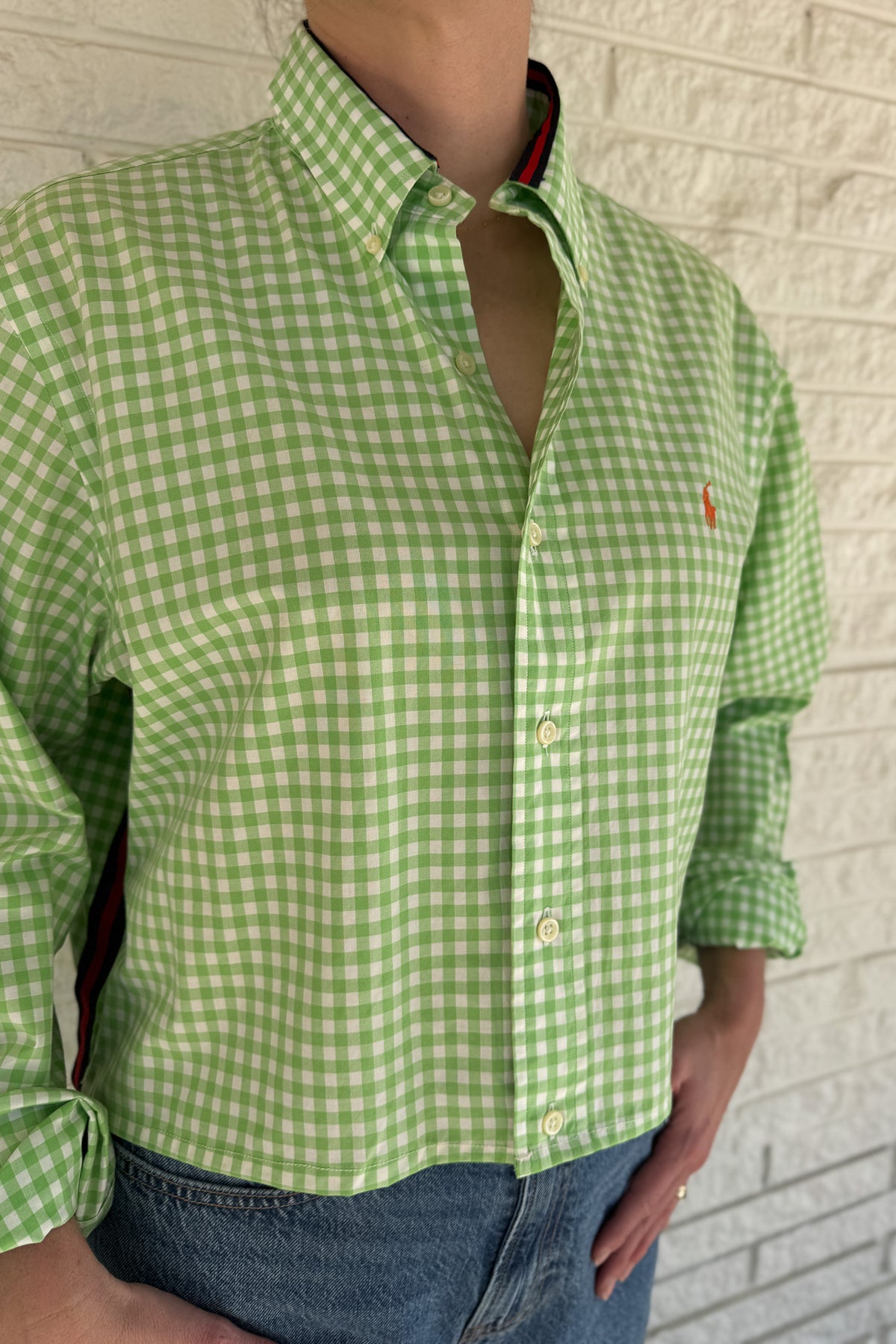 The modern Stormy button-down is designed to move with you for an easy, elevated feel. The cropped front flows into a longer back for a flattering high-low shape that adds interest to a classic style. Finished details give this piece a polished look that works dressed up or casual.