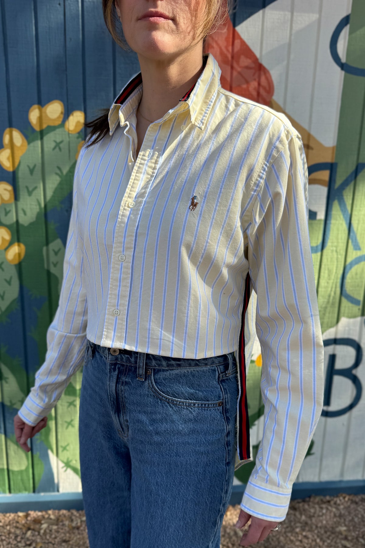 The modern Stormy button-down is designed to move with you for an easy, elevated feel. The cropped front flows into a longer back for a flattering high-low shape that adds interest to a classic style. Finished details give this piece a polished look that works dressed up or casual.