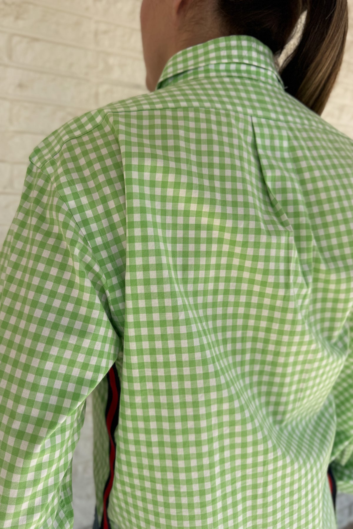 The modern Stormy button-down is designed to move with you for an easy, elevated feel. The cropped front flows into a longer back for a flattering high-low shape that adds interest to a classic style. Finished details give this piece a polished look that works dressed up or casual.