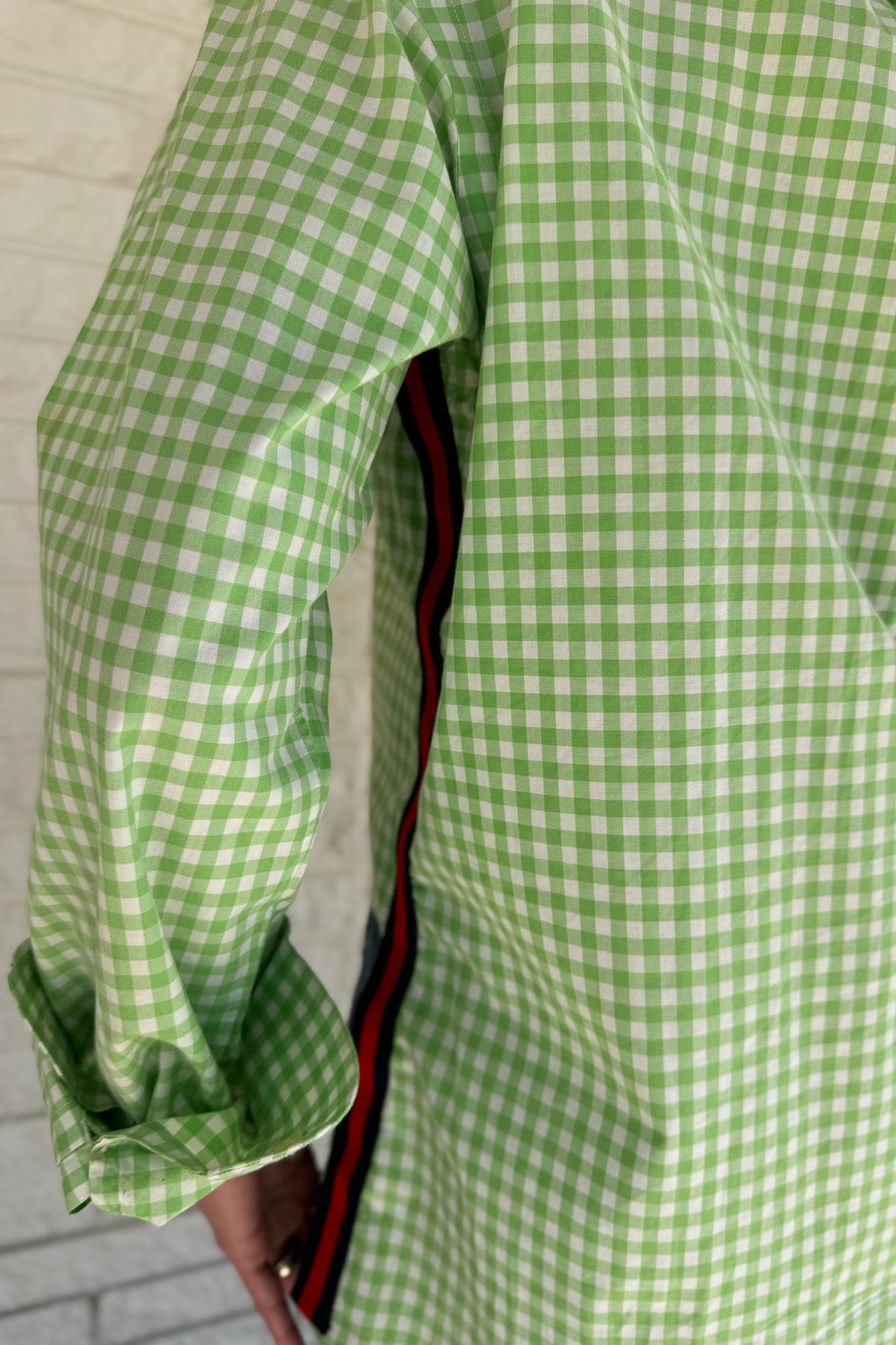 The modern Stormy button-down is designed to move with you for an easy, elevated feel. The cropped front flows into a longer back for a flattering high-low shape that adds interest to a classic style. Finished details give this piece a polished look that works dressed up or casual.