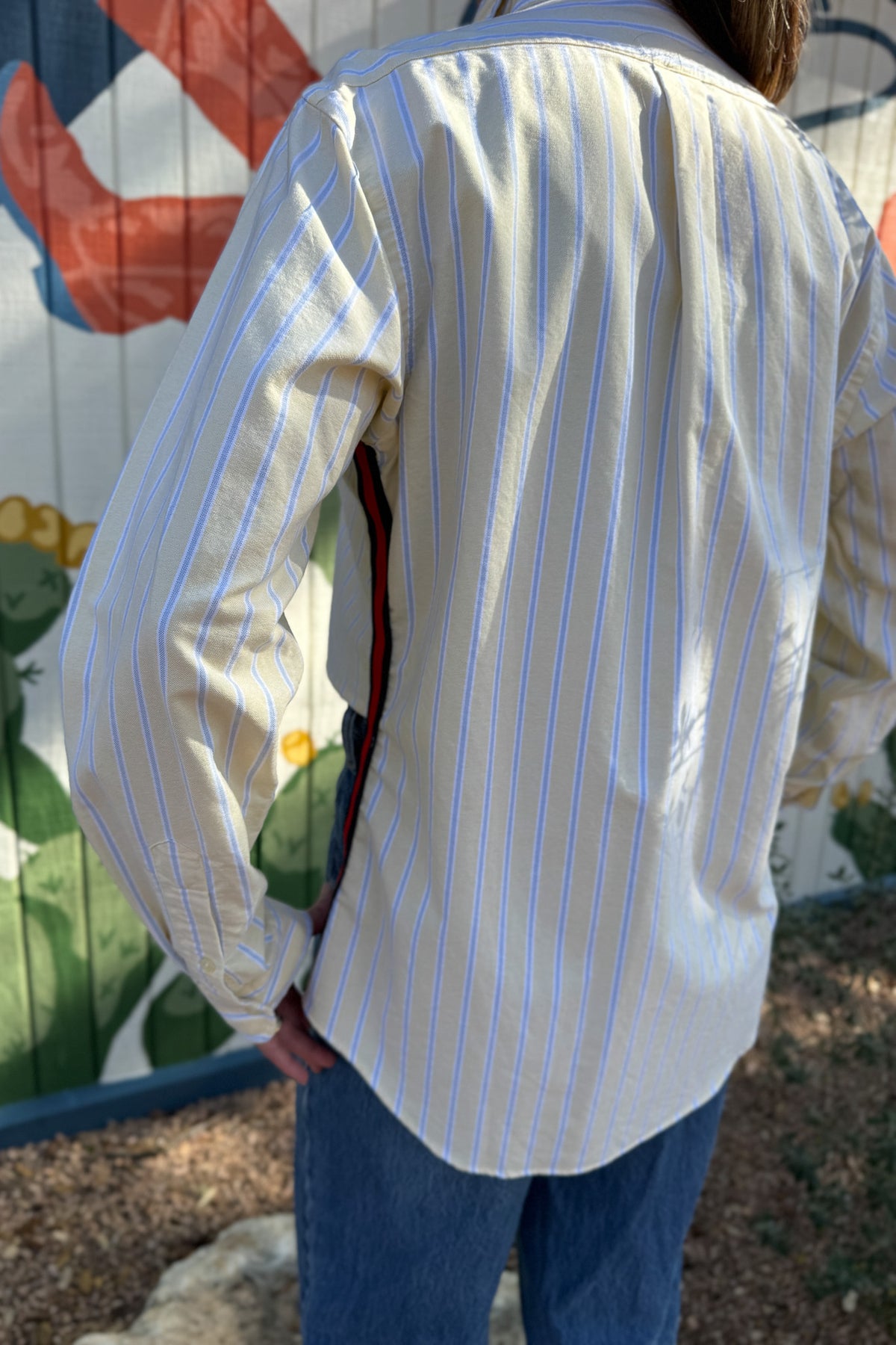 The modern Stormy button-down is designed to move with you for an easy, elevated feel. The cropped front flows into a longer back for a flattering high-low shape that adds interest to a classic style. Finished details give this piece a polished look that works dressed up or casual.