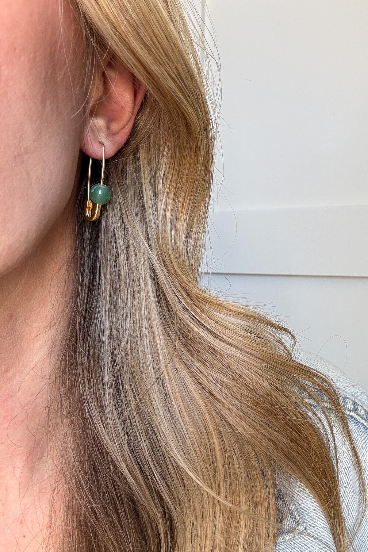 Our Roxy Stone Safety Pin Earring offers eye catching style with its aventurine stone and fully functioning safety pin motif.
18k gold plated over stainless steel
water proof

nickel / lead free
made in the USA with materials ethically sourced from Turkey