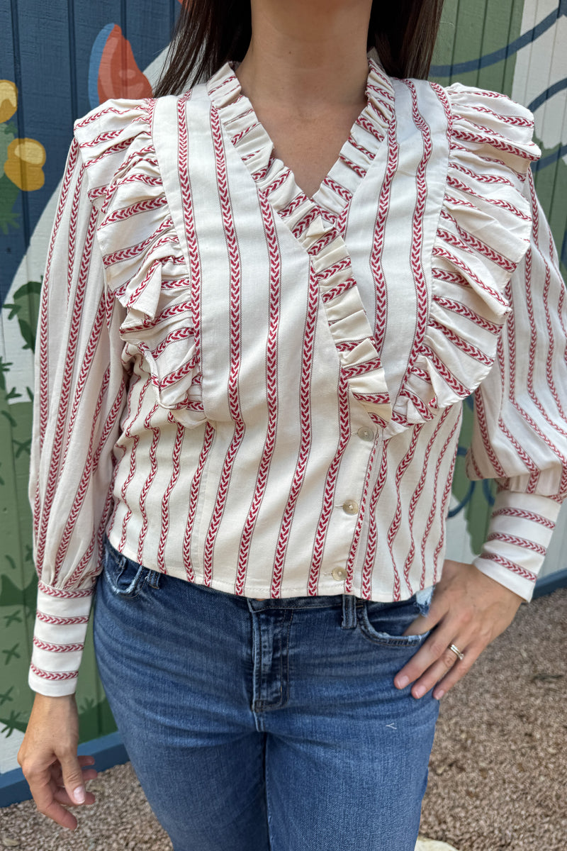 &nbsp;Ruffled (but not too ruffled) and stunning, this 100% cotton top is an effortless piece made for everyday wear on the days when you want to feel well styled. Its lightweight feel and easy silhouette make it perfect for layering or wearing solo. Designed with clean lines and breathable fabric, it’s a go-to for comfort and style.