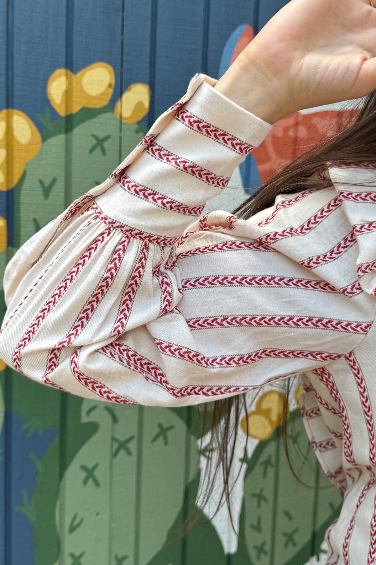 &nbsp;Ruffled (but not too ruffled) and stunning, this 100% cotton top is an effortless piece made for everyday wear on the days when you want to feel well styled. Its lightweight feel and easy silhouette make it perfect for layering or wearing solo. Designed with clean lines and breathable fabric, it’s a go-to for comfort and style.