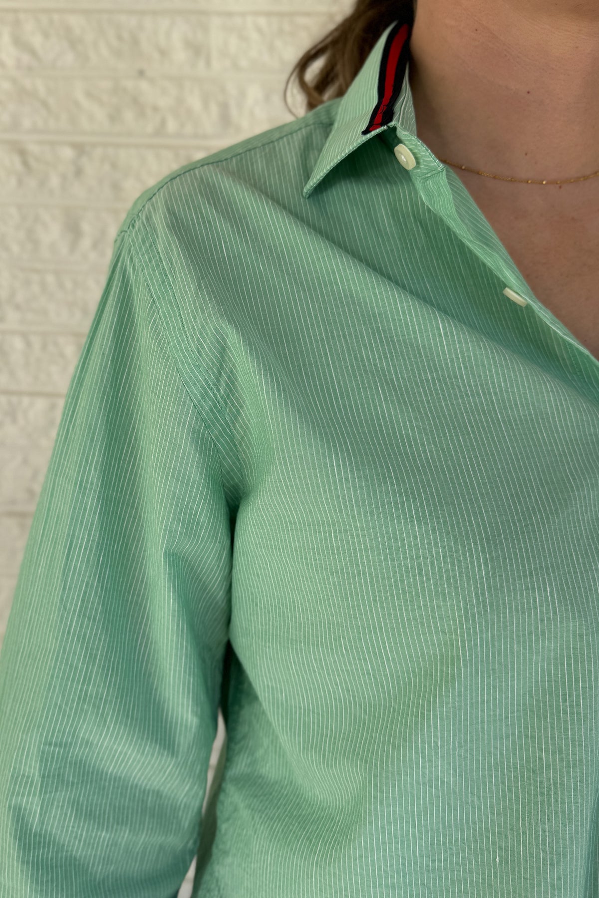 An upcycled men’s shirt reworked into a cropped, raw hem, easy silhouette that feels fresh and relaxed. Soft, feminine, and one-of-a-kind. Designed to be a one size fits most when worn open, wear it buttoned up and it fits like small or medium.