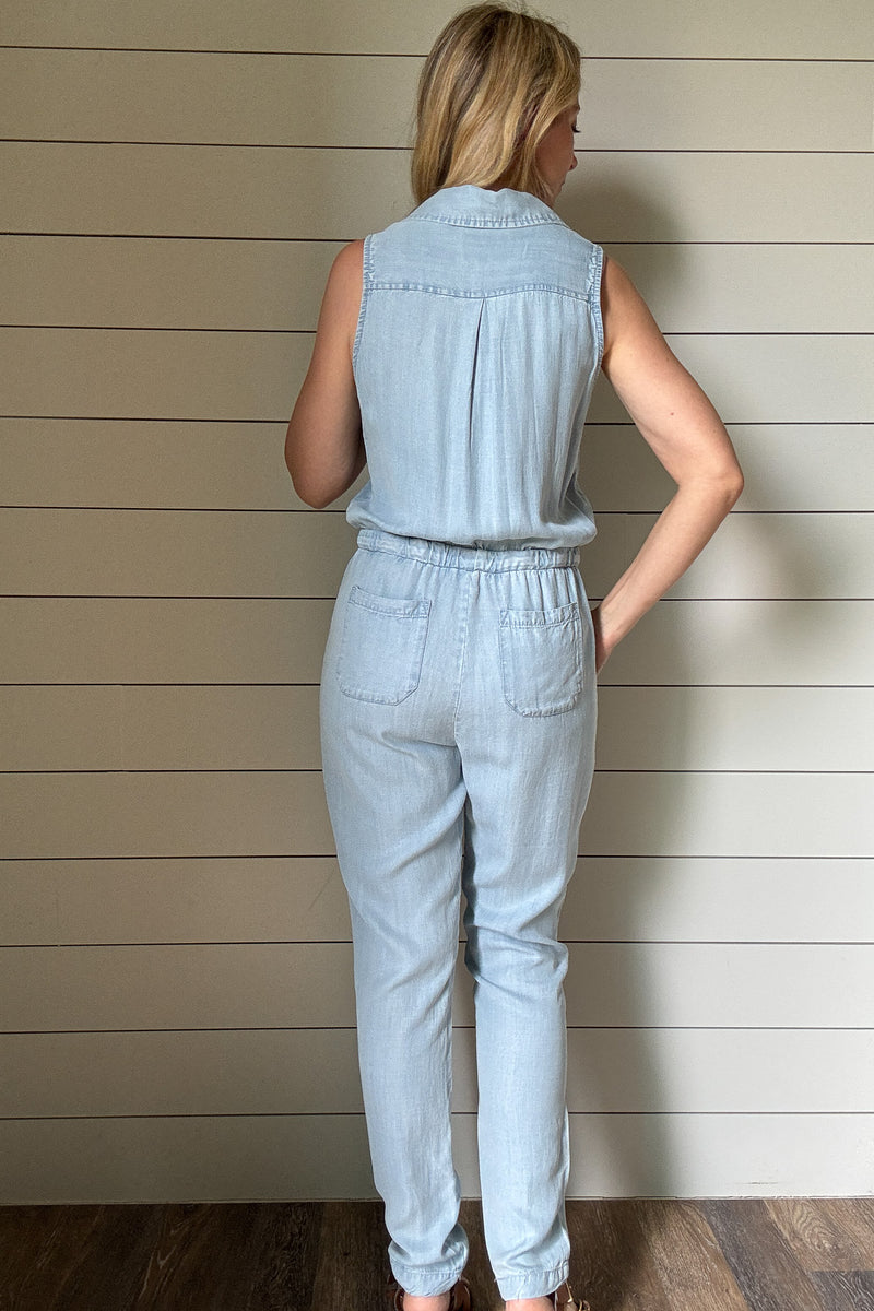 Meet your new go-to: the one-and-done Summer Jumper. Made from buttery soft, breathable Tencel fabric, this lightweight style keeps you cool and comfortable all day. The sleeveless design and button-front detail give it a laid-back vibe, while the drawstring waist adds shape without sacrificing ease. Chest pockets and relaxed-fit legs keep the look casual but pulled together—perfect for weekends, errands, or travel. Pair with sneakers or sandals and you're out the door in minutes. Made with sustainable fabr