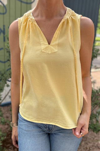 tencel clothing, women’s fashion, sustainable women’s fashion, tencel top, lightweight sleeveless top, breathable summer top, effortless style, everyday women’s clothing, soft drape top, butter yellow top