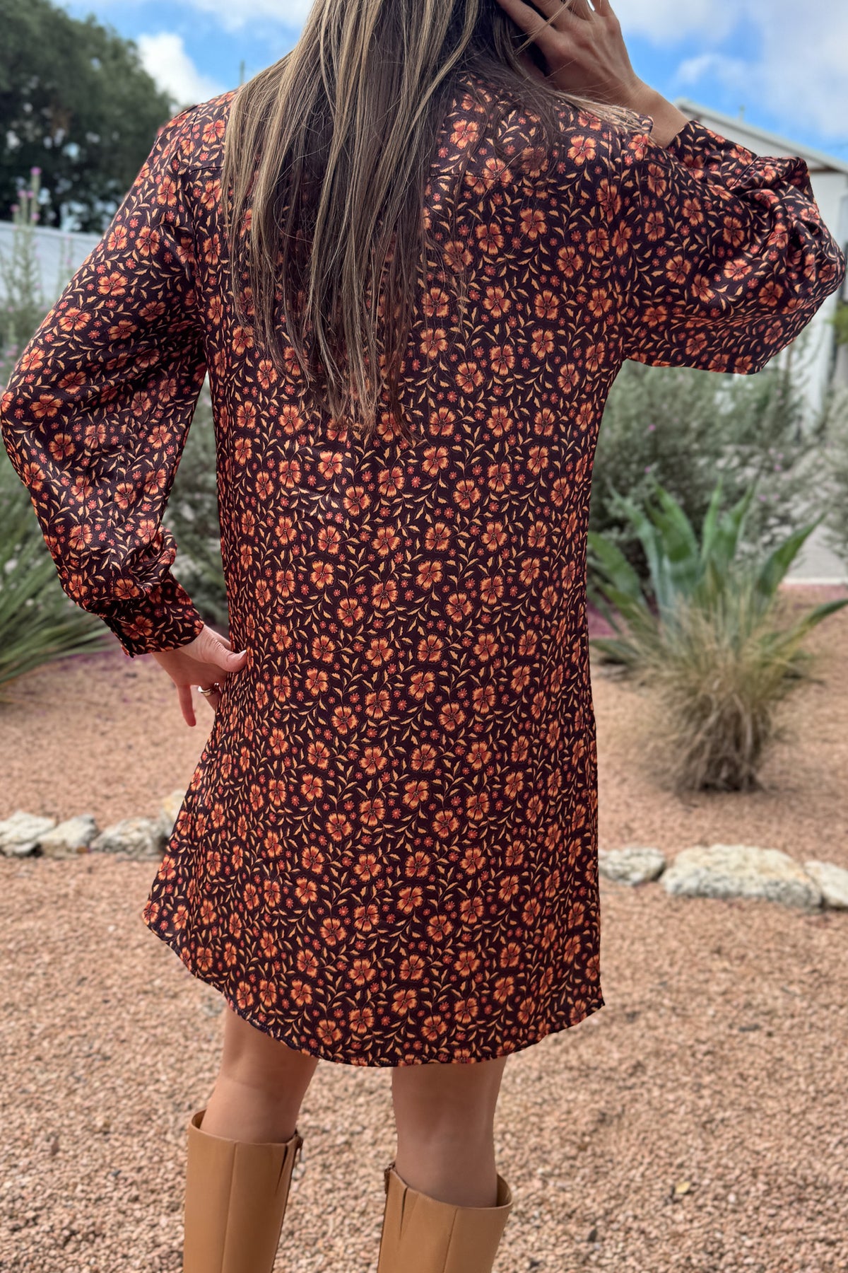 &nbsp;A fresh pop of autumn blooms makes this 34" dress a standout for any occasion. Designed in soft 100% viscose, it flows effortlessly with a relaxed silhouette and features a feminine tie-neck detail for an added touch of charm.